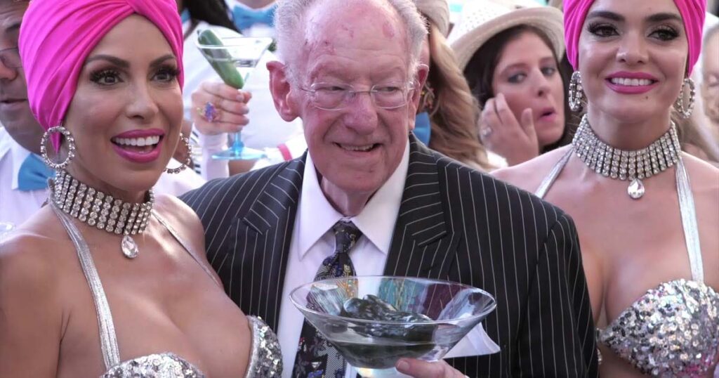 Former Las Vegas Mayor Oscar Goodman Drinking Martinis with Show Girls